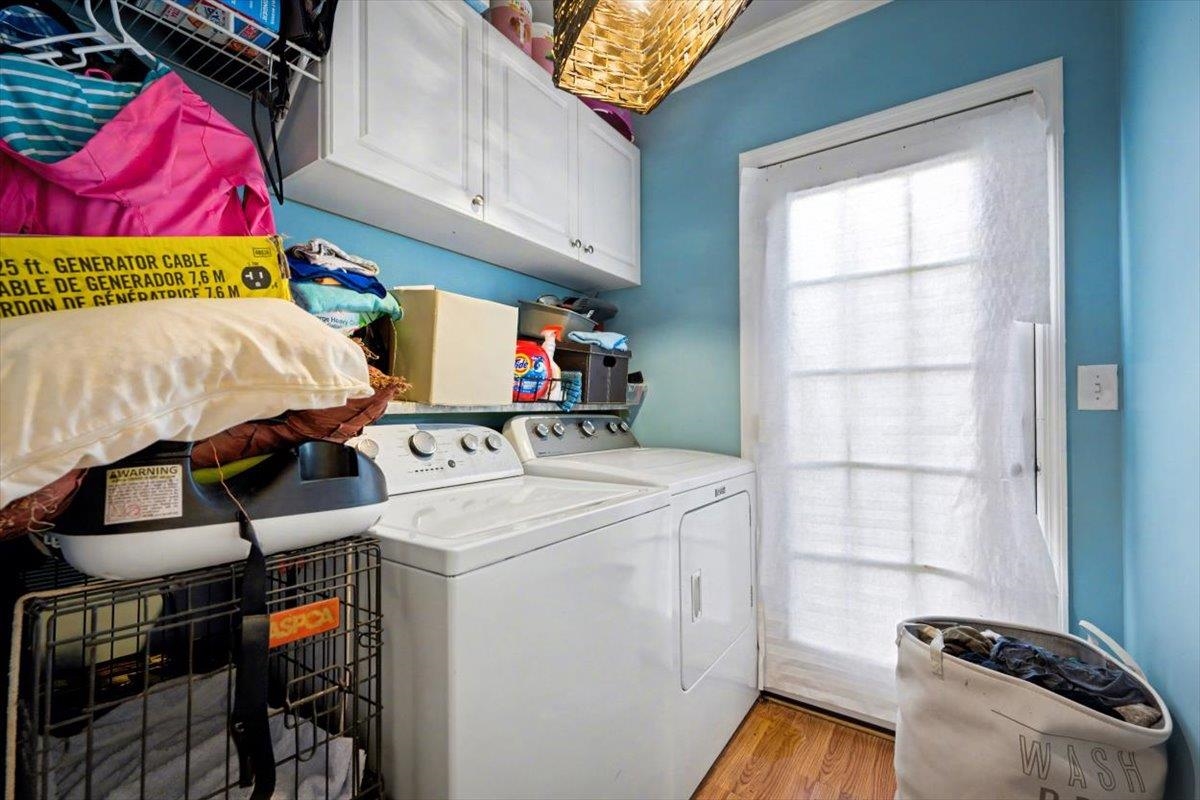 979 Altara Avenue St. Augustine, FL 32086 - Photo 22 of 27 a utility room with dryer and washer