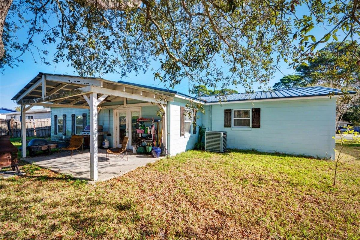979 Altara Avenue St. Augustine, FL 32086 - Photo 27 of 27 a view of a house with patio