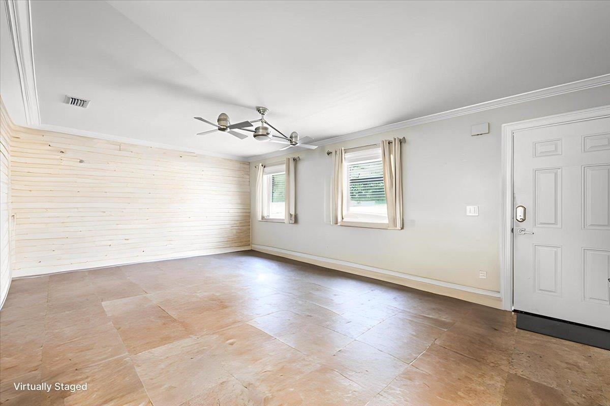 979 Altara Avenue St. Augustine, FL 32086 - Photo 4 of 27 wooden floor in an empty room with a window