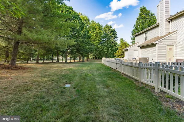 a view of a house with a big yard