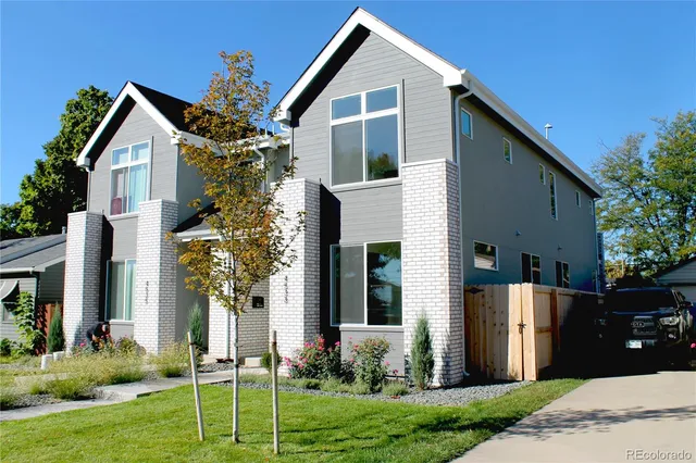 a front view of house with a yard