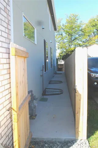 a view of a house with a tree