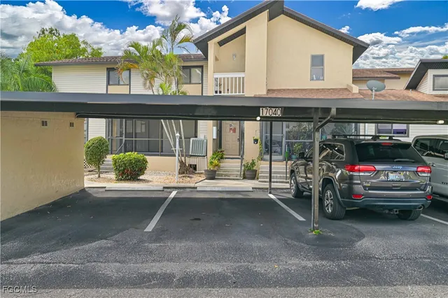 a view of a car park in front of a building