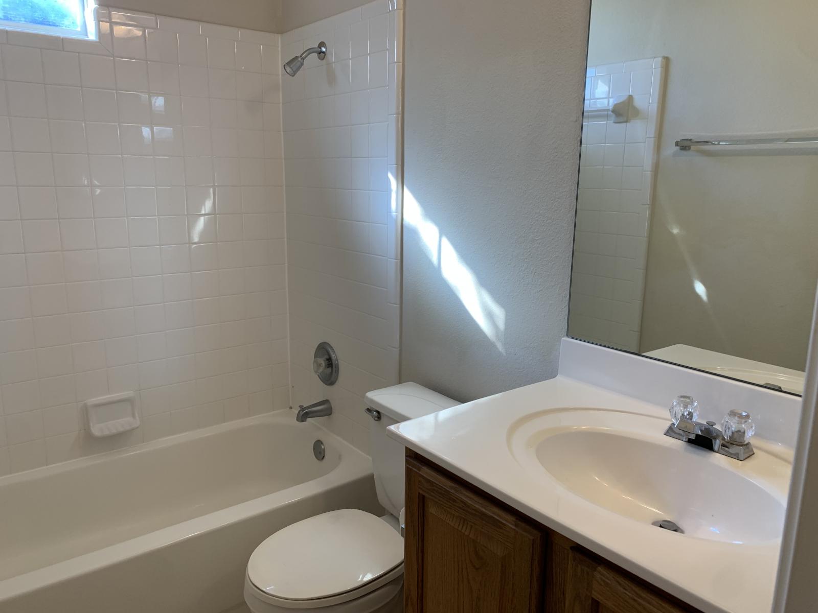 11000 Anderson Mill Road, Unit 29 Austin, TX 78750 - Photo 15 of 27 a bathroom with a sink toilet and shower