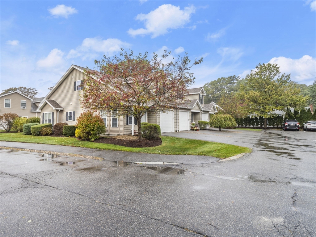 170 Beach Road, Unit 52 Salisbury, MA 01952 - Photo 2 of 34 a view of road with house in background