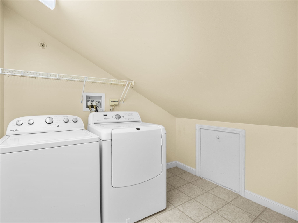 170 Beach Road, Unit 52 Salisbury, MA 01952 - Photo 25 of 34 a utility room with dryer and washer