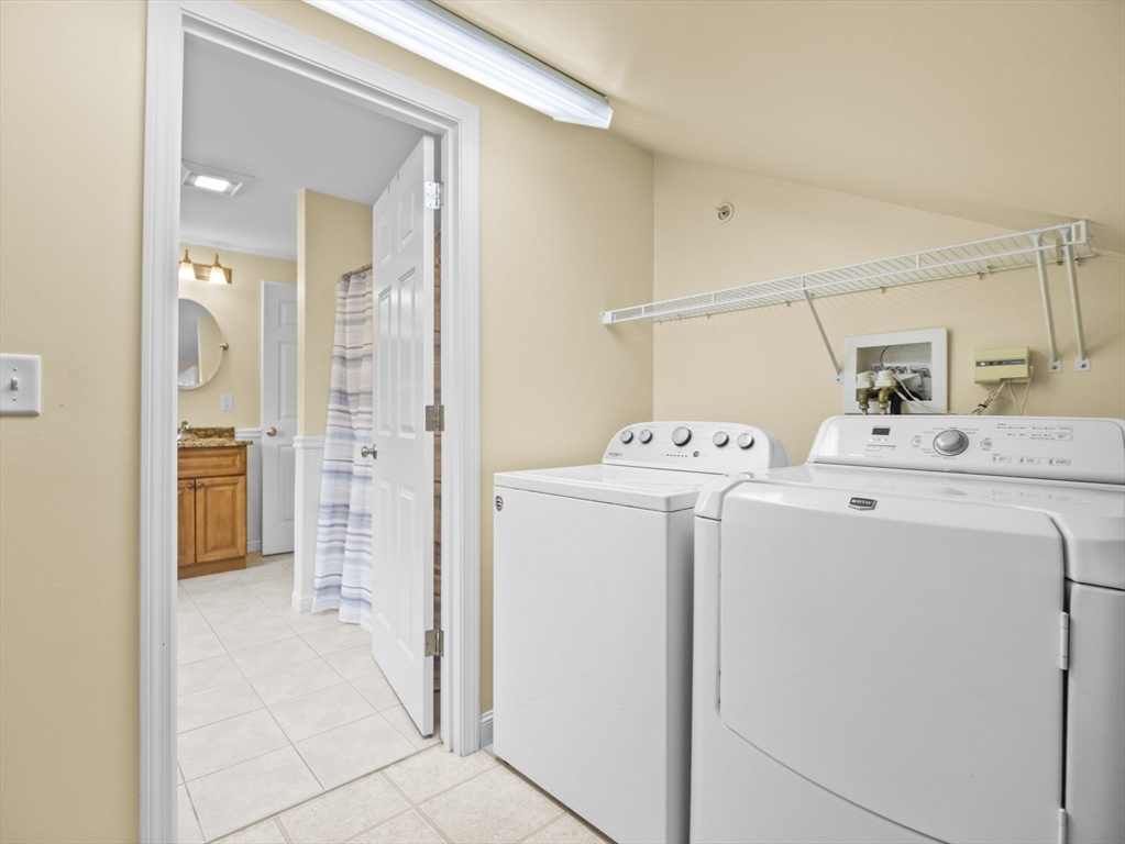 170 Beach Road, Unit 52 Salisbury, MA 01952 - Photo 26 of 34 a utility room with dryer and washer
