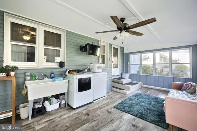 a view of a room with wooden walls