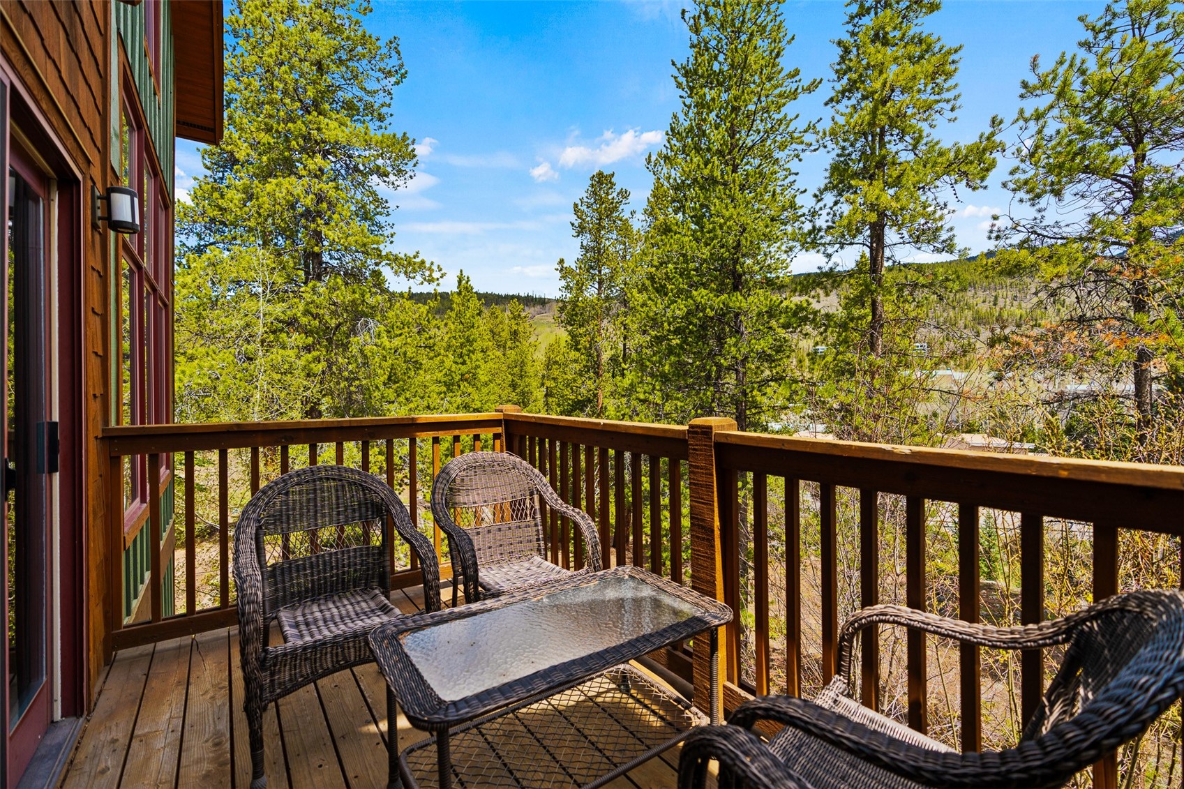 57 Lake Ridge Circle, Unit 1848 Keystone, CO 80435 - Photo 12 of 49 a view of a two chairs in the balcony