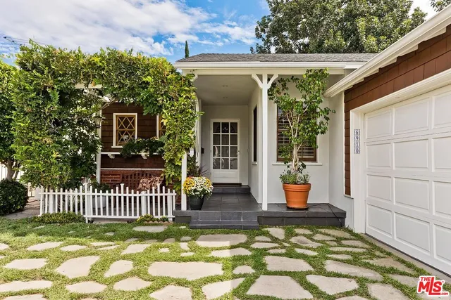 a view of a porch with furniture