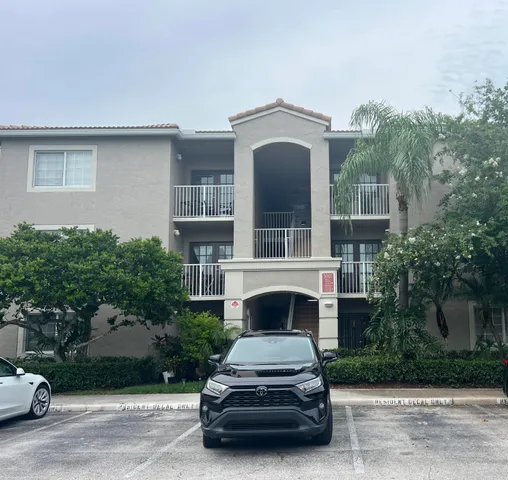 a car parked in front of a house