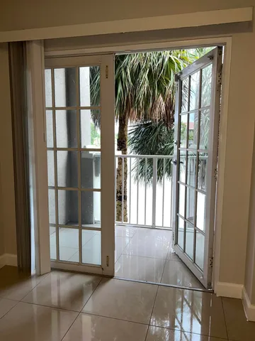 a view of a large window with an outdoor space