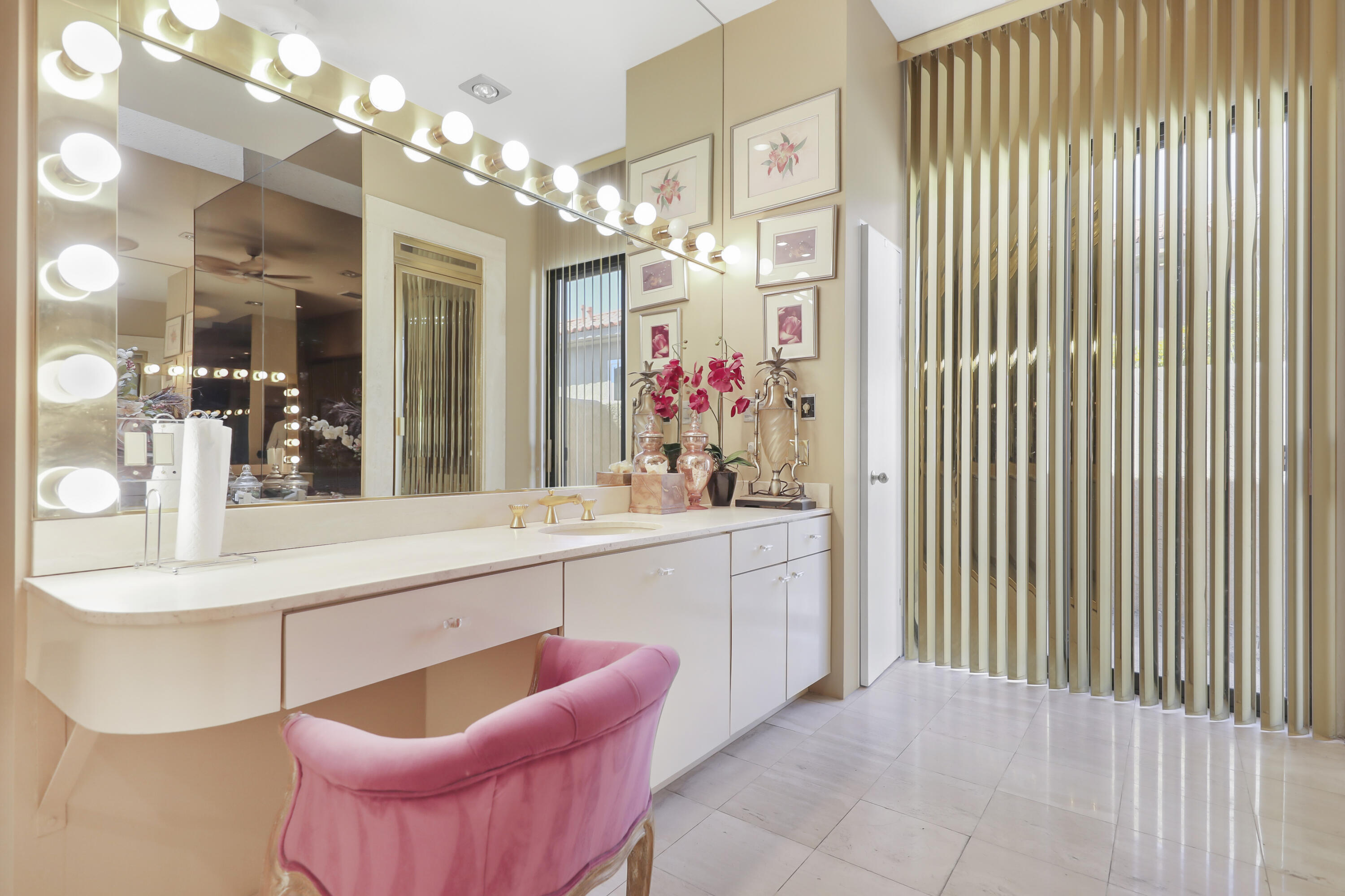 43721 Port Maria Road Bermuda Dunes, CA 92203 - Photo 15 of 37 a large living room with a large window and chandelier