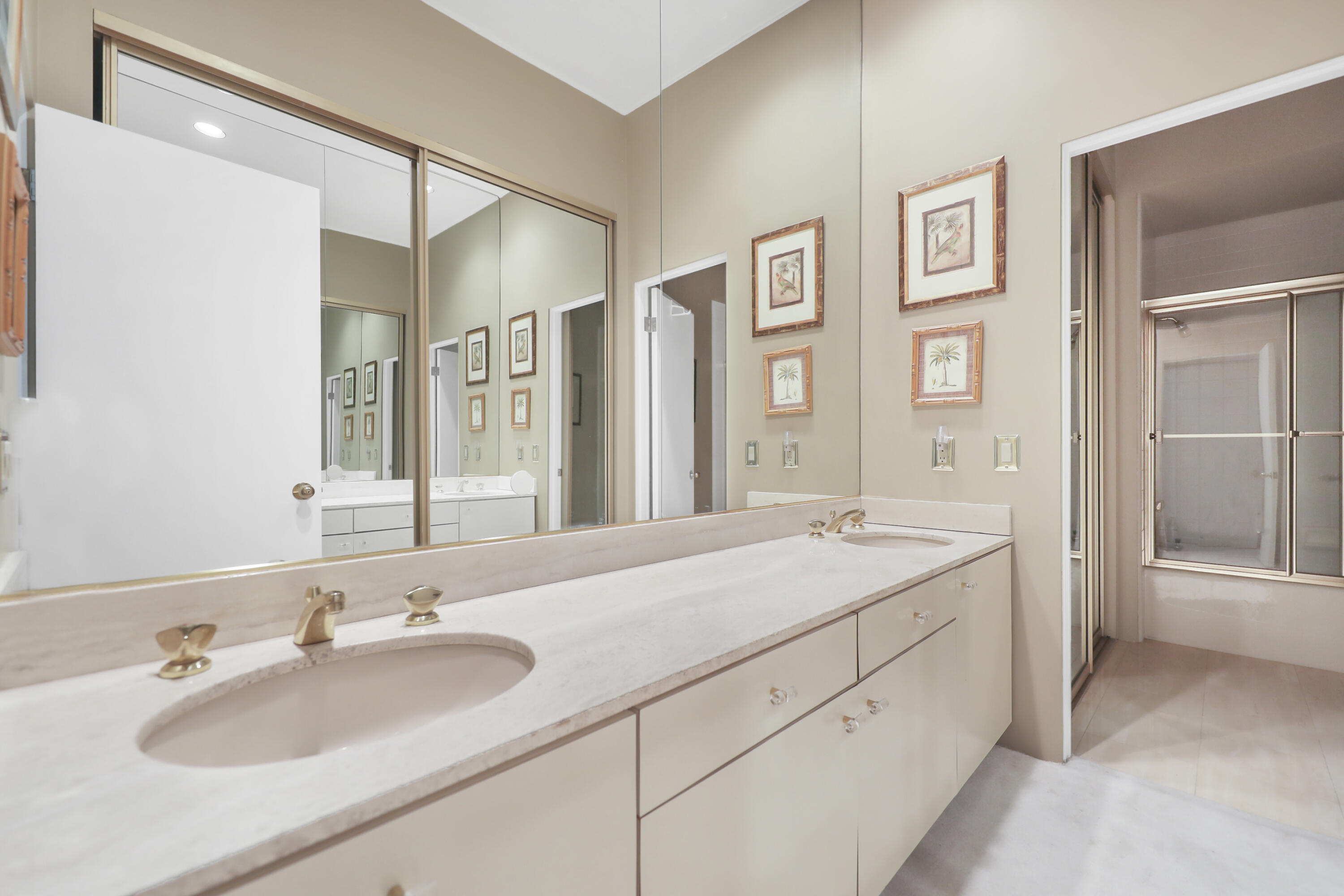 43721 Port Maria Road Bermuda Dunes, CA 92203 - Photo 22 of 37 a bathroom with a sink and a mirror