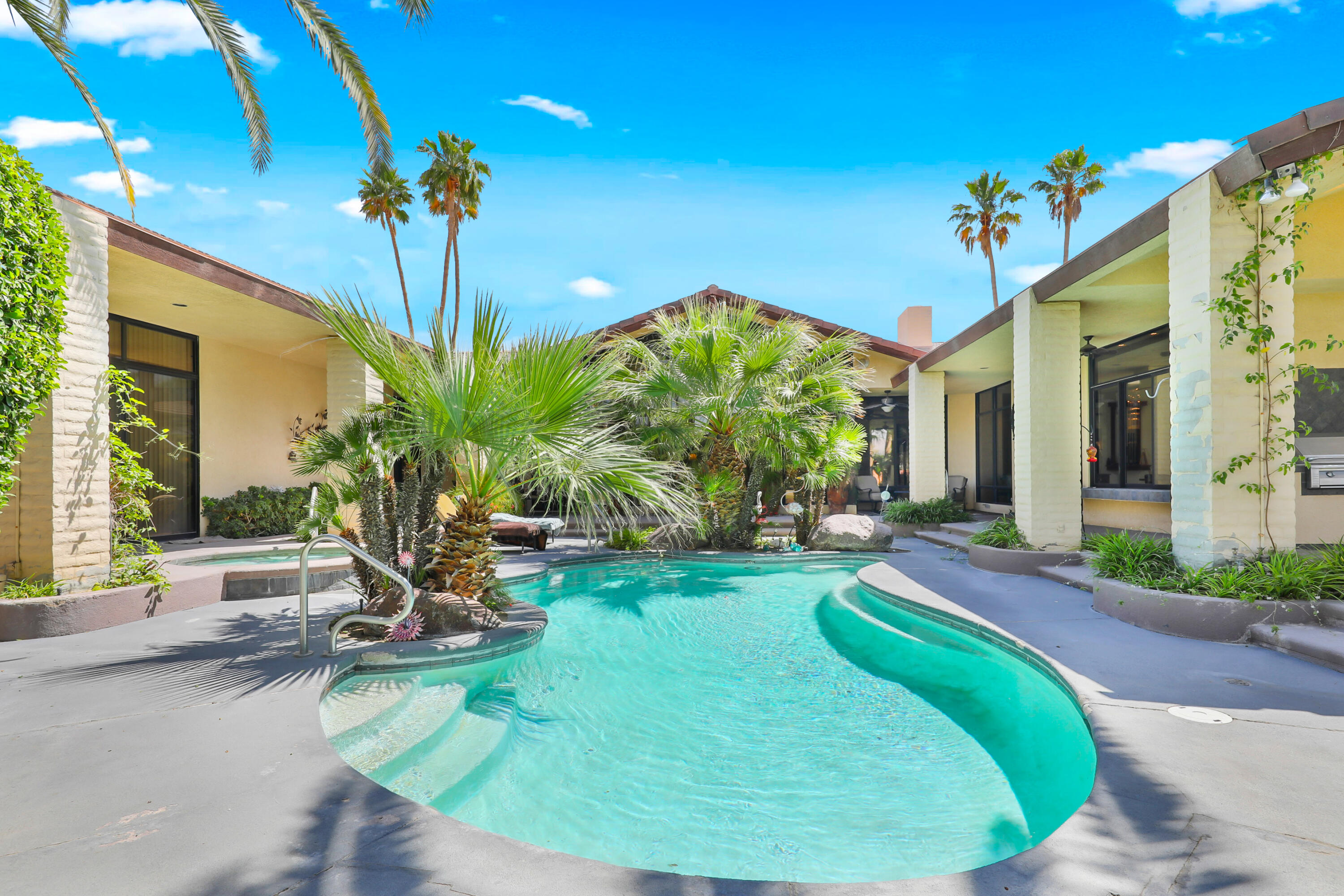 43721 Port Maria Road Bermuda Dunes, CA 92203 - Photo 26 of 37 a view of a house with backyard porch and sitting area