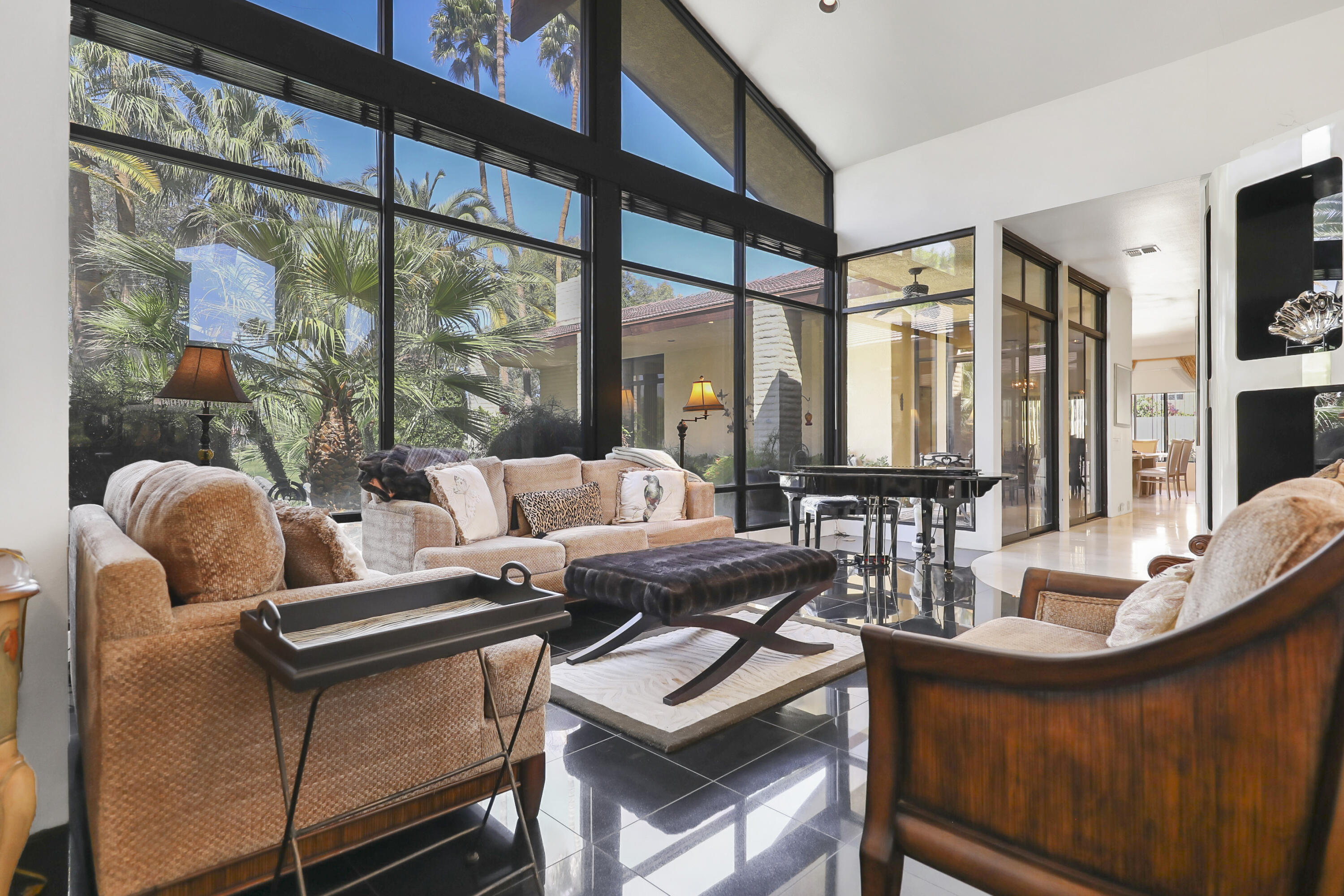 43721 Port Maria Road Bermuda Dunes, CA 92203 - Photo 7 of 37 a living room with furniture and a large window