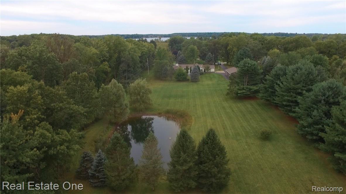1449 Lake Nepessing Road Lapeer, MI 48446 - Photo 5 of 27 Property Back.jpg