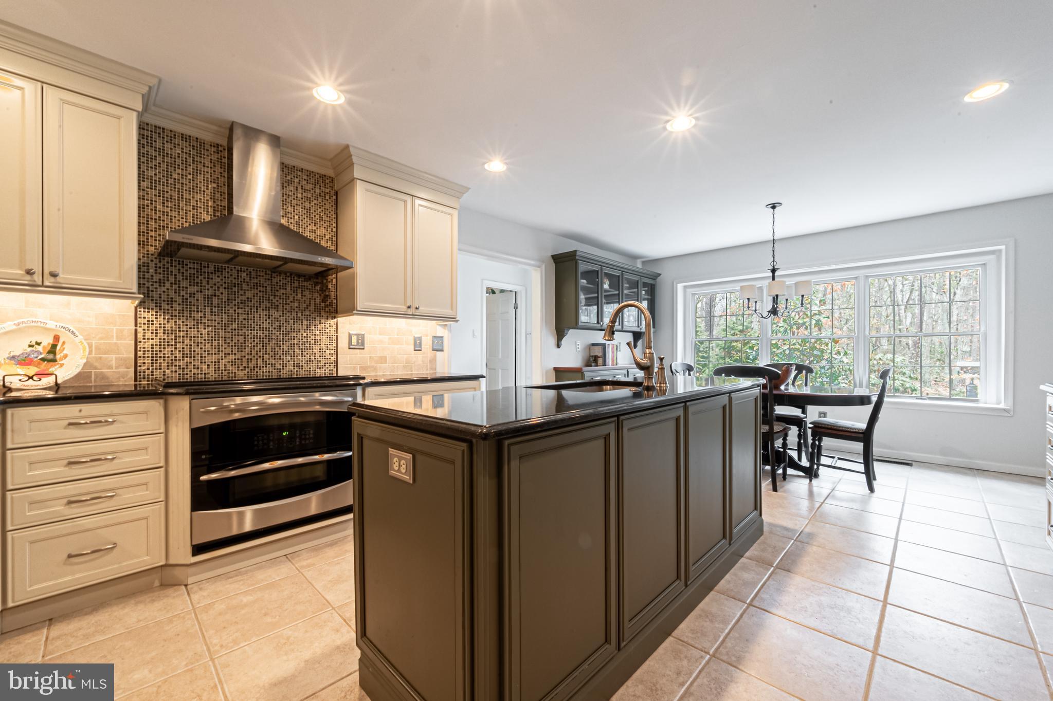 13 Pointe View Drive Medford, NJ 08055 - Photo 11 of 33 a kitchen with granite countertop a stove a sink and a refrigerator