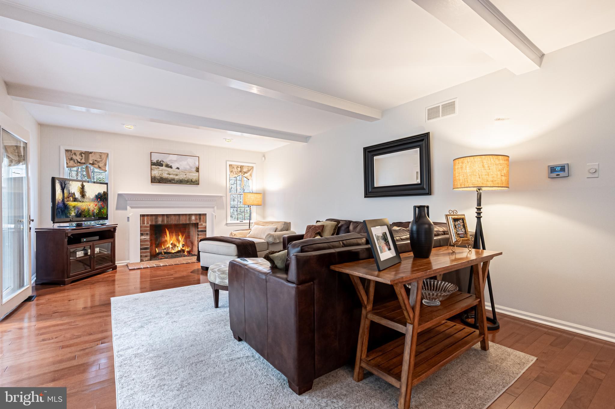 13 Pointe View Drive Medford, NJ 08055 - Photo 14 of 33 a living room with furniture a fireplace and a flat screen tv