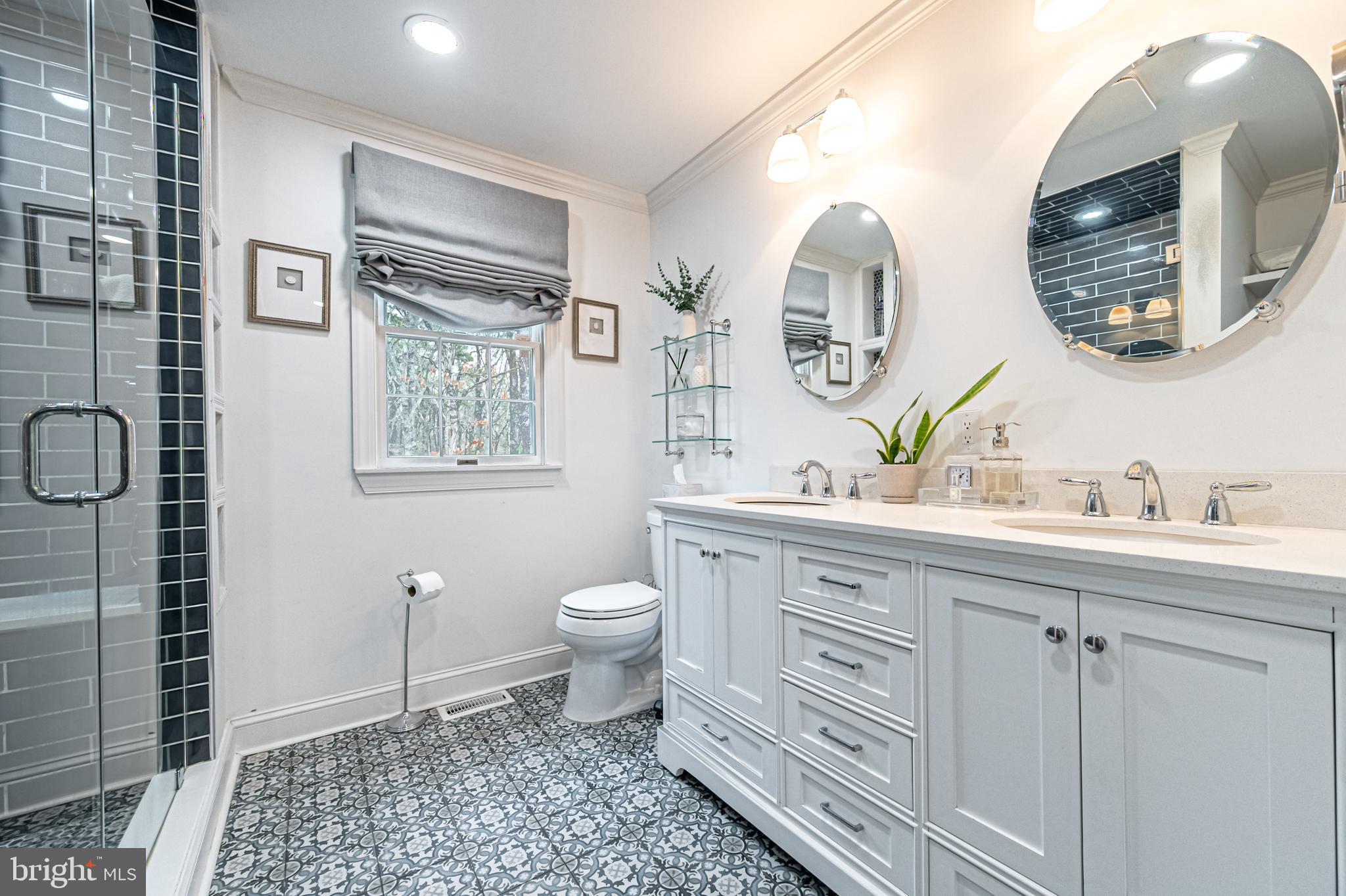 13 Pointe View Drive Medford, NJ 08055 - Photo 21 of 33 a spacious bathroom with a toilet a double vanity sink and a mirror