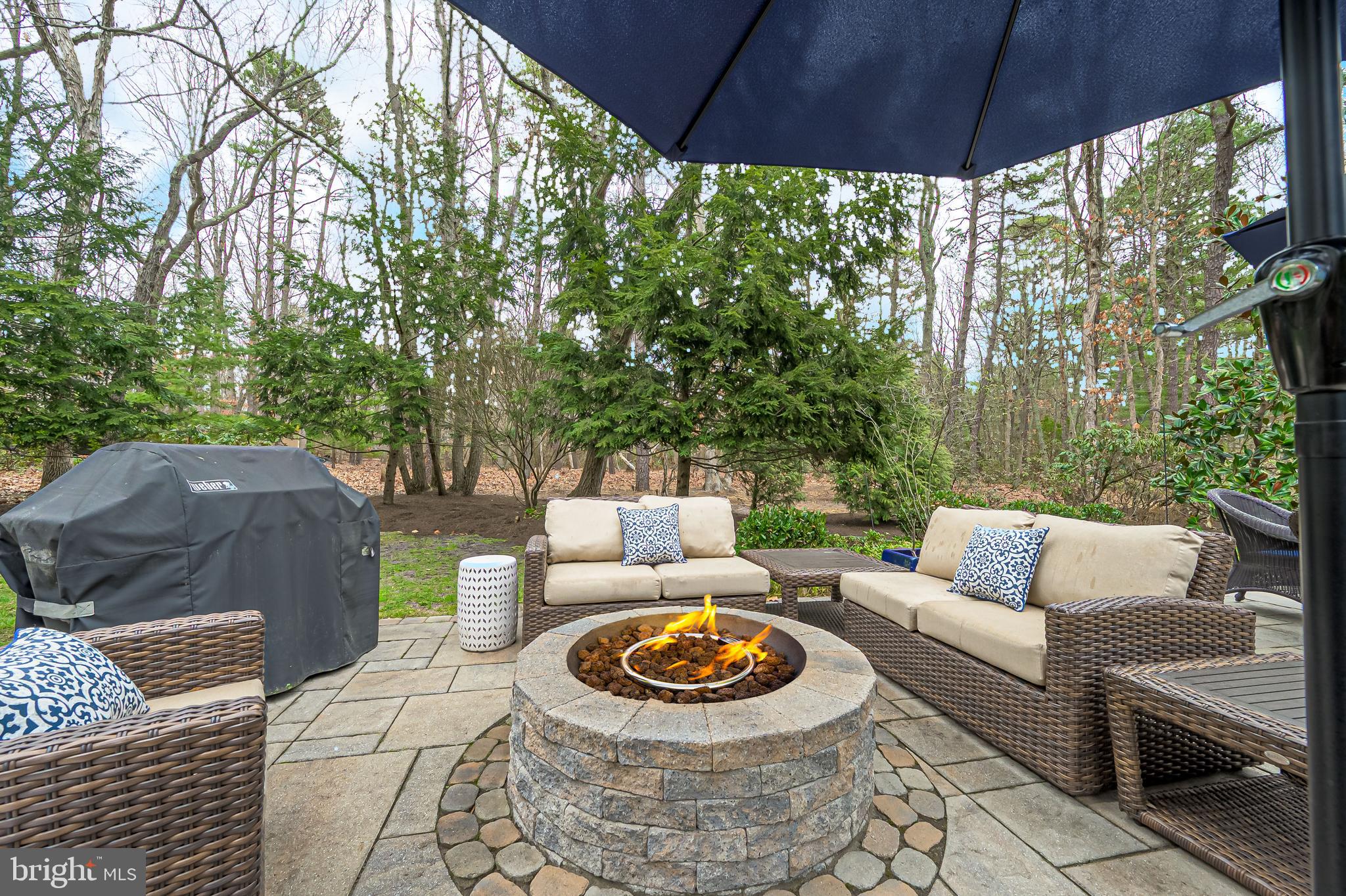 13 Pointe View Drive Medford, NJ 08055 - Photo 33 of 33 a backyard of a house with couches and a table and chairs