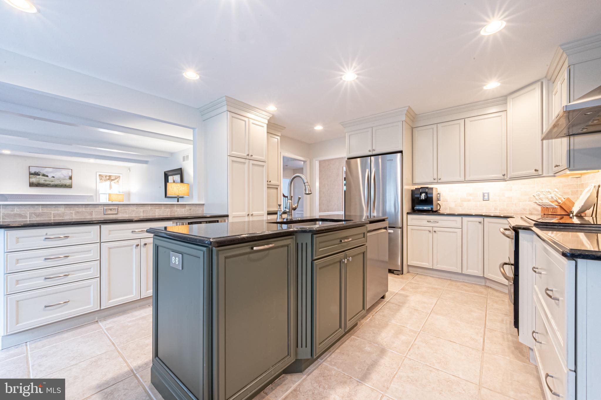 13 Pointe View Drive Medford, NJ 08055 - Photo 9 of 33 a kitchen with granite countertop white cabinets and white stainless steel appliances