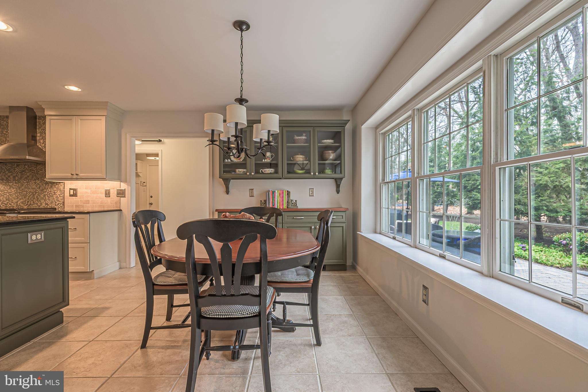 13 Pointe View Drive Medford, NJ 08055 - Photo 10 of 33 a view of a dining room with furniture large windows and a chandelier
