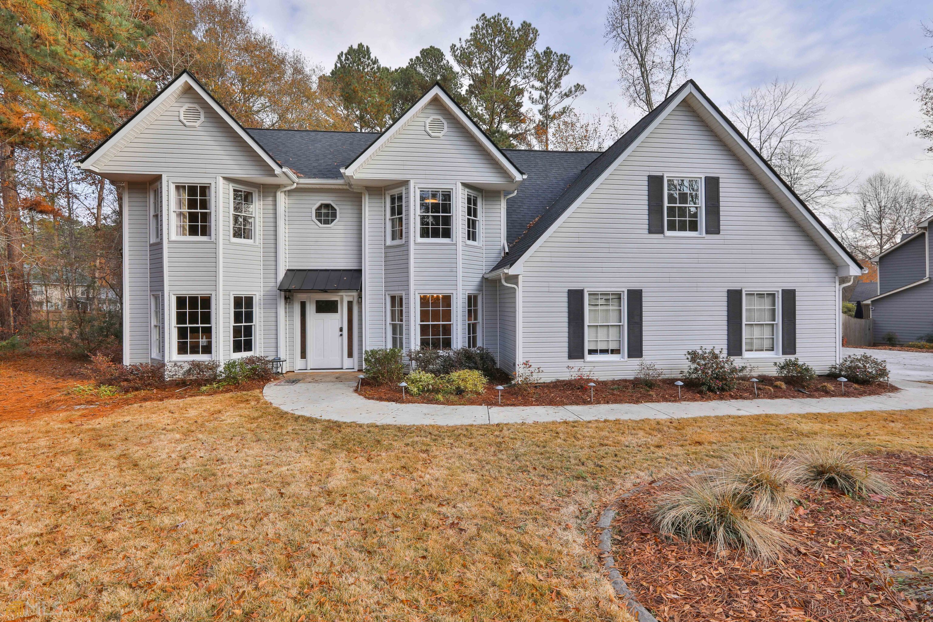 502 Richey Place Peachtree City, GA 30269 - Photo 1 of 1 a front view of a house with a yard