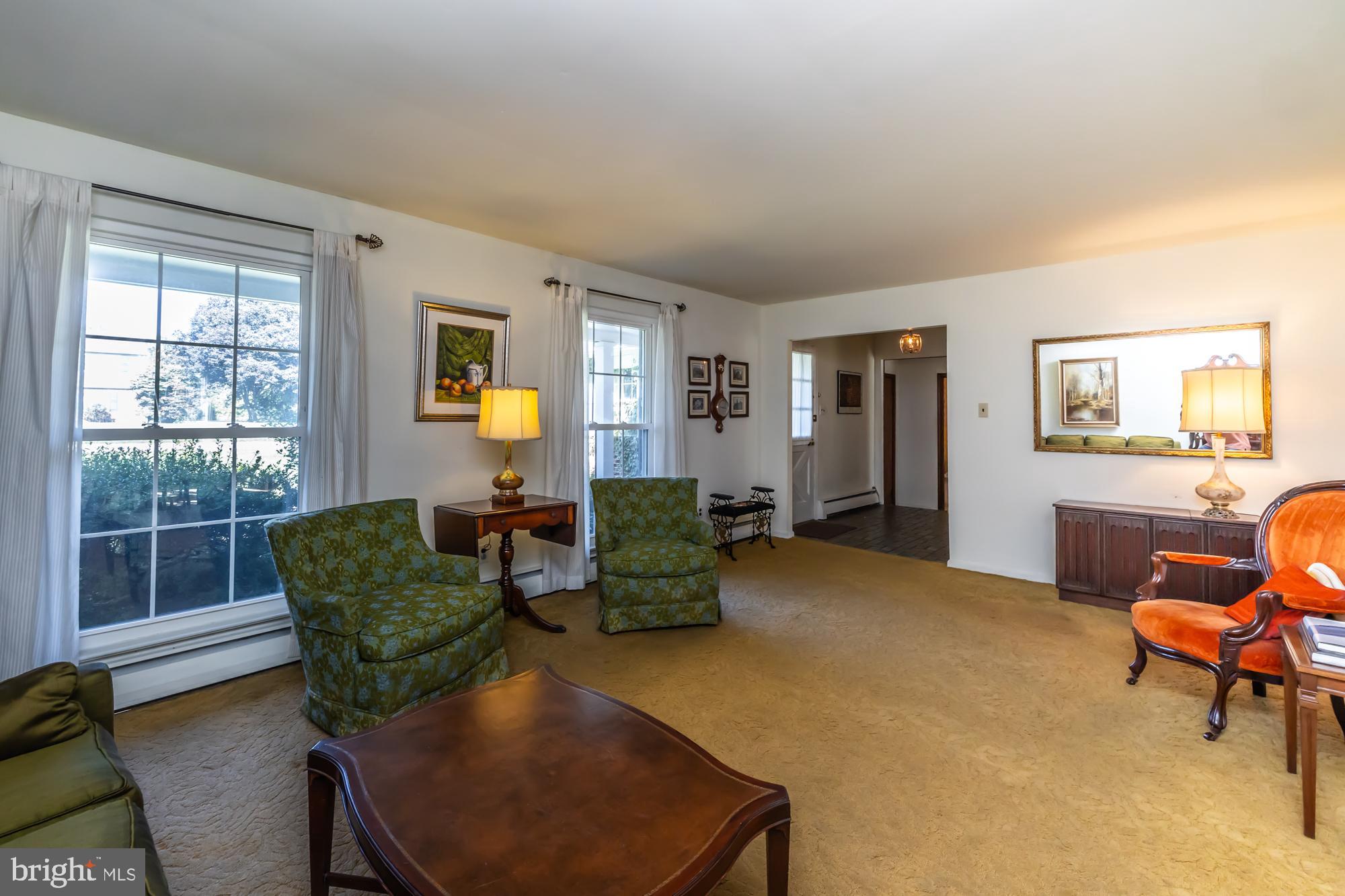 12 Flintshire Road Malvern, PA 19355 - Photo 12 of 50 a living room with furniture and a window