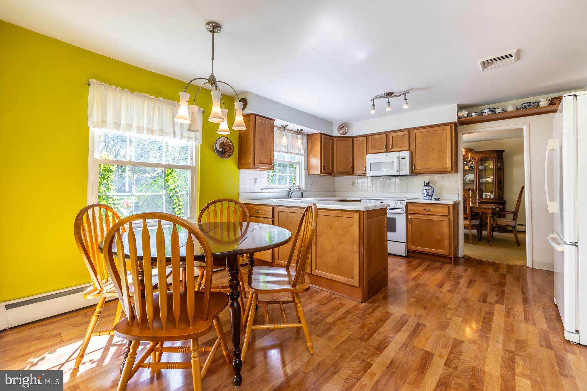 12 Flintshire Road Malvern, PA 19355 - Photo 17 of 50 a view of a dining room with furniture and a window