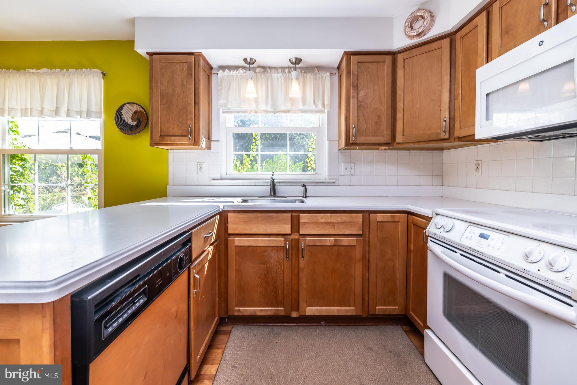 12 Flintshire Road Malvern, PA 19355 - Photo 20 of 50 a kitchen with a sink and a stove