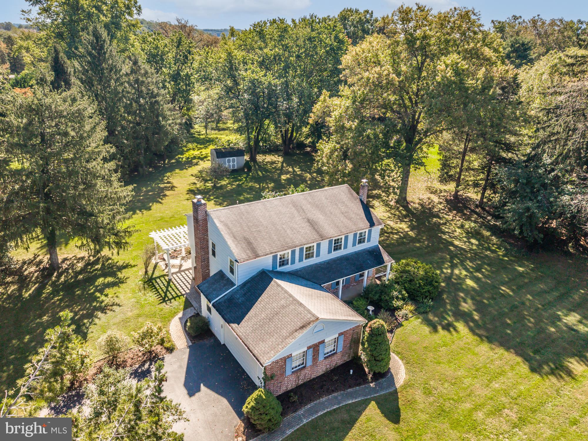 12 Flintshire Road Malvern, PA 19355 - Photo 2 of 50 a view of a small house with roof deck