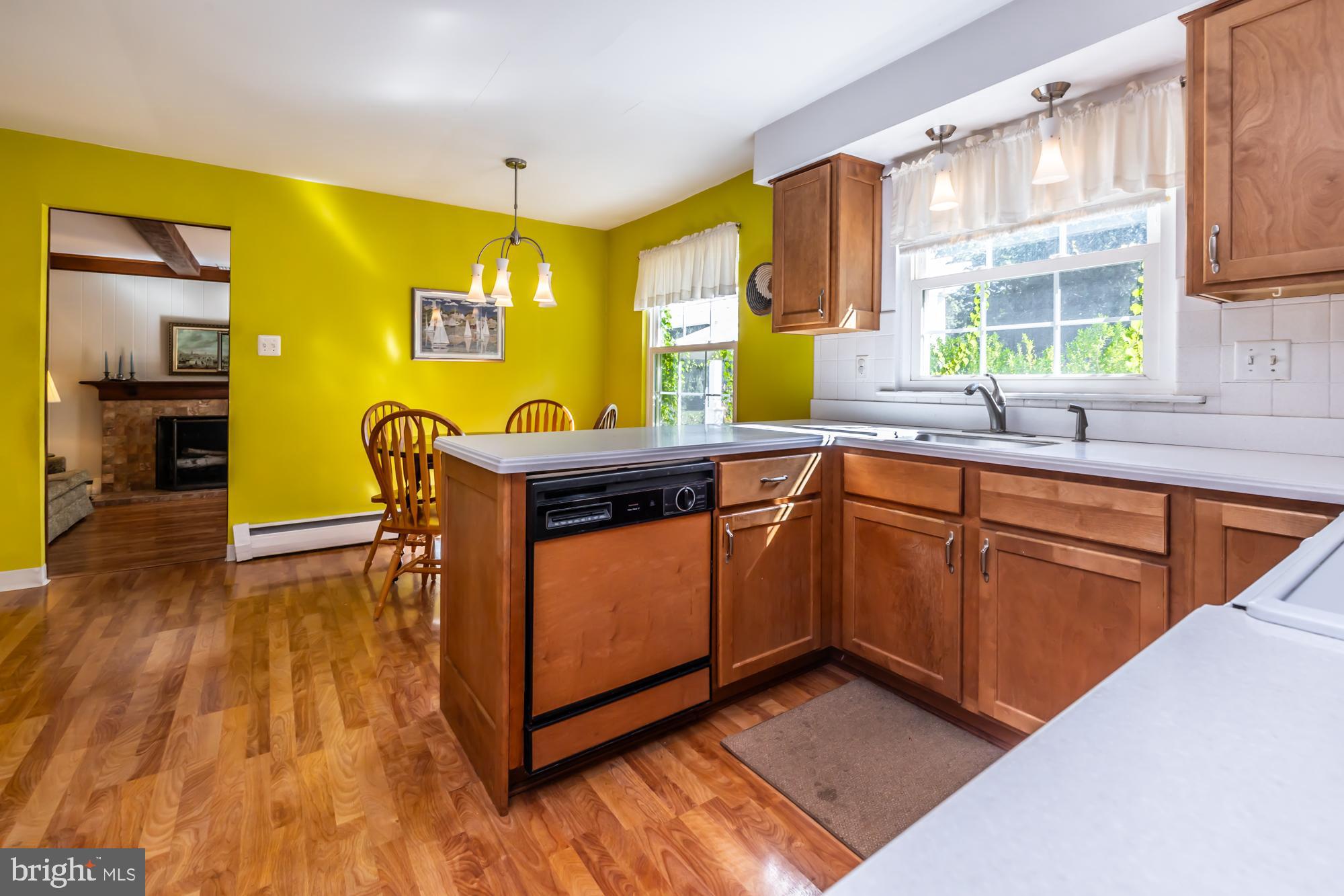12 Flintshire Road Malvern, PA 19355 - Photo 21 of 50 a kitchen with wooden floors and a sink