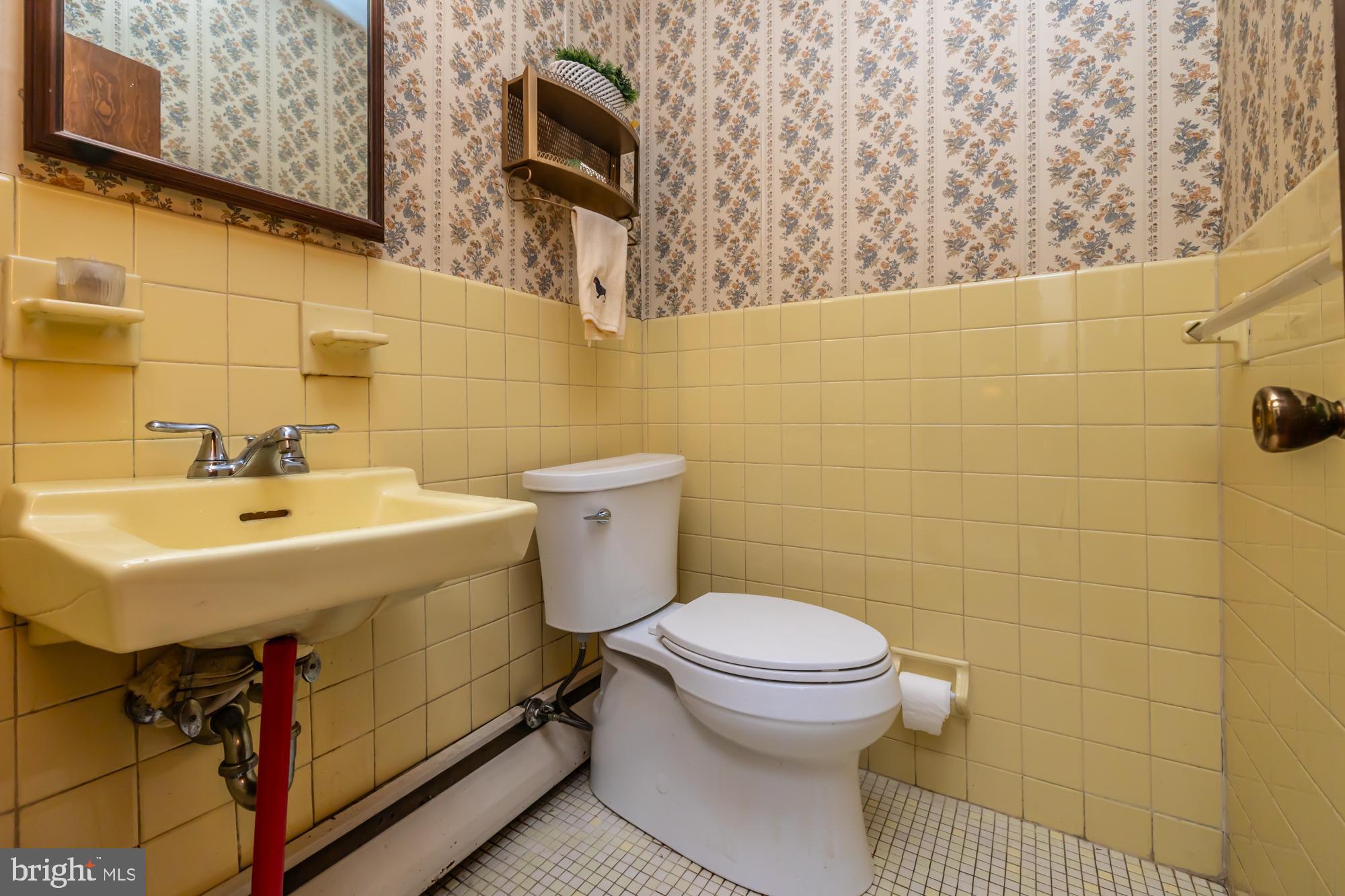 12 Flintshire Road Malvern, PA 19355 - Photo 30 of 50 a bathroom with a sink and a toilet