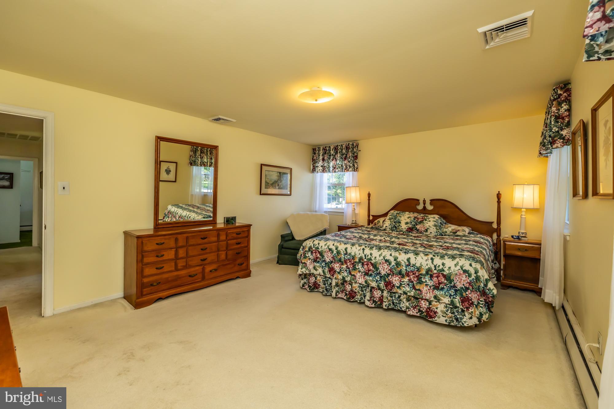 12 Flintshire Road Malvern, PA 19355 - Photo 32 of 50 a bedroom with a bed and dresser