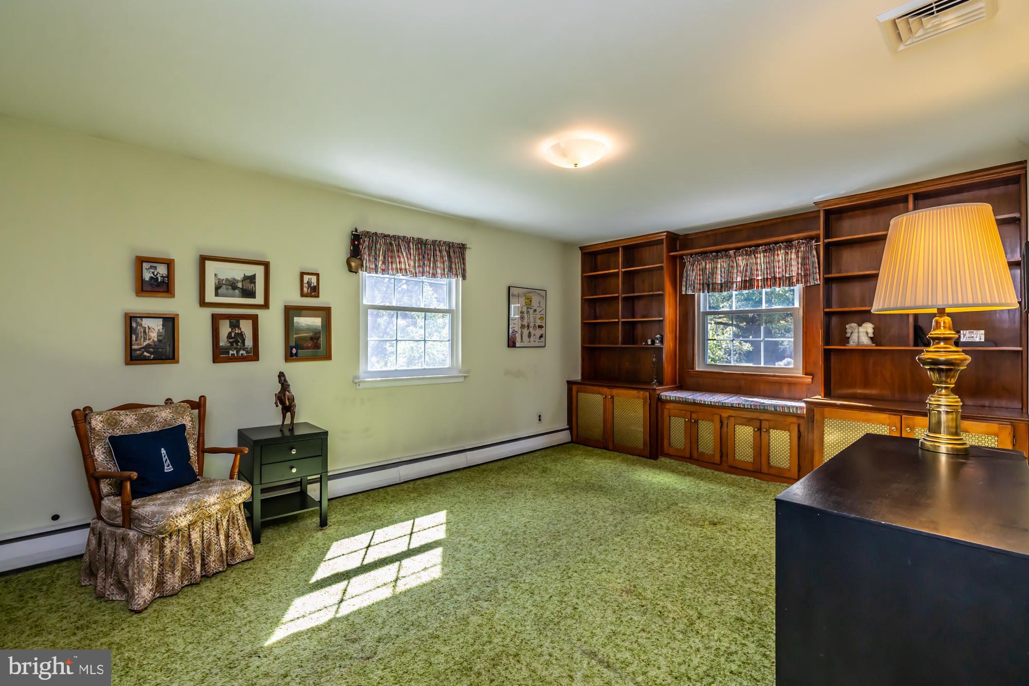 12 Flintshire Road Malvern, PA 19355 - Photo 40 of 50 a living room with furniture and large windows
