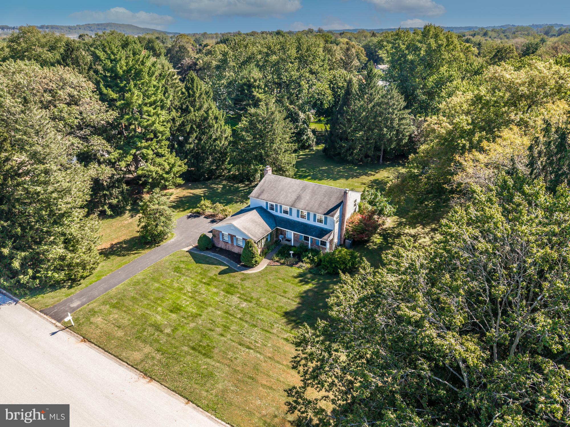 12 Flintshire Road Malvern, PA 19355 - Photo 4 of 50 a view of a yard with plants