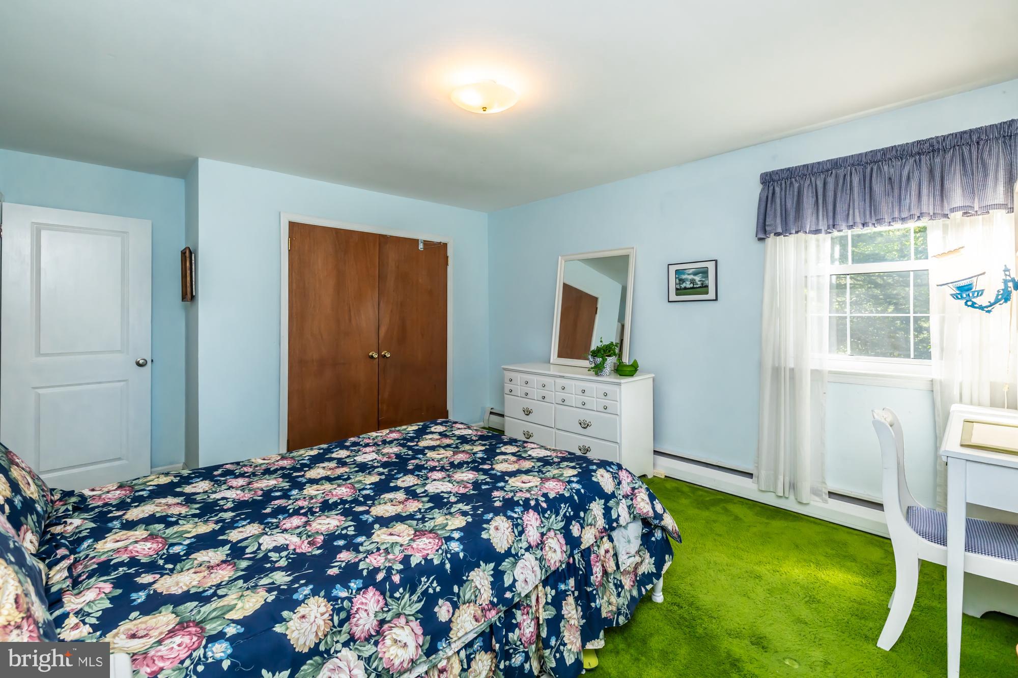 12 Flintshire Road Malvern, PA 19355 - Photo 45 of 50 a bedroom with a bed and a window