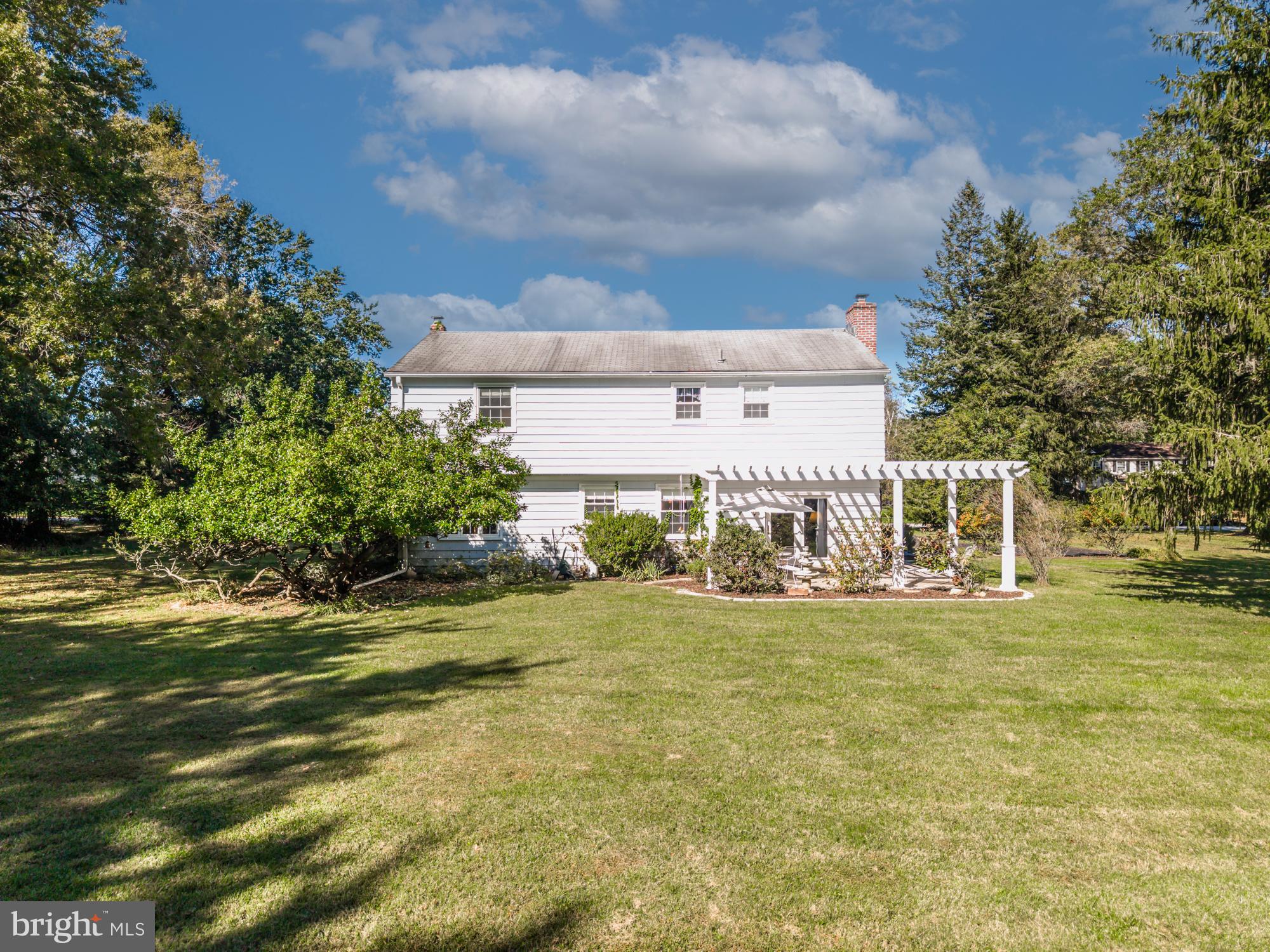 12 Flintshire Road Malvern, PA 19355 - Photo 48 of 50 a view of a house with a yard and sitting area