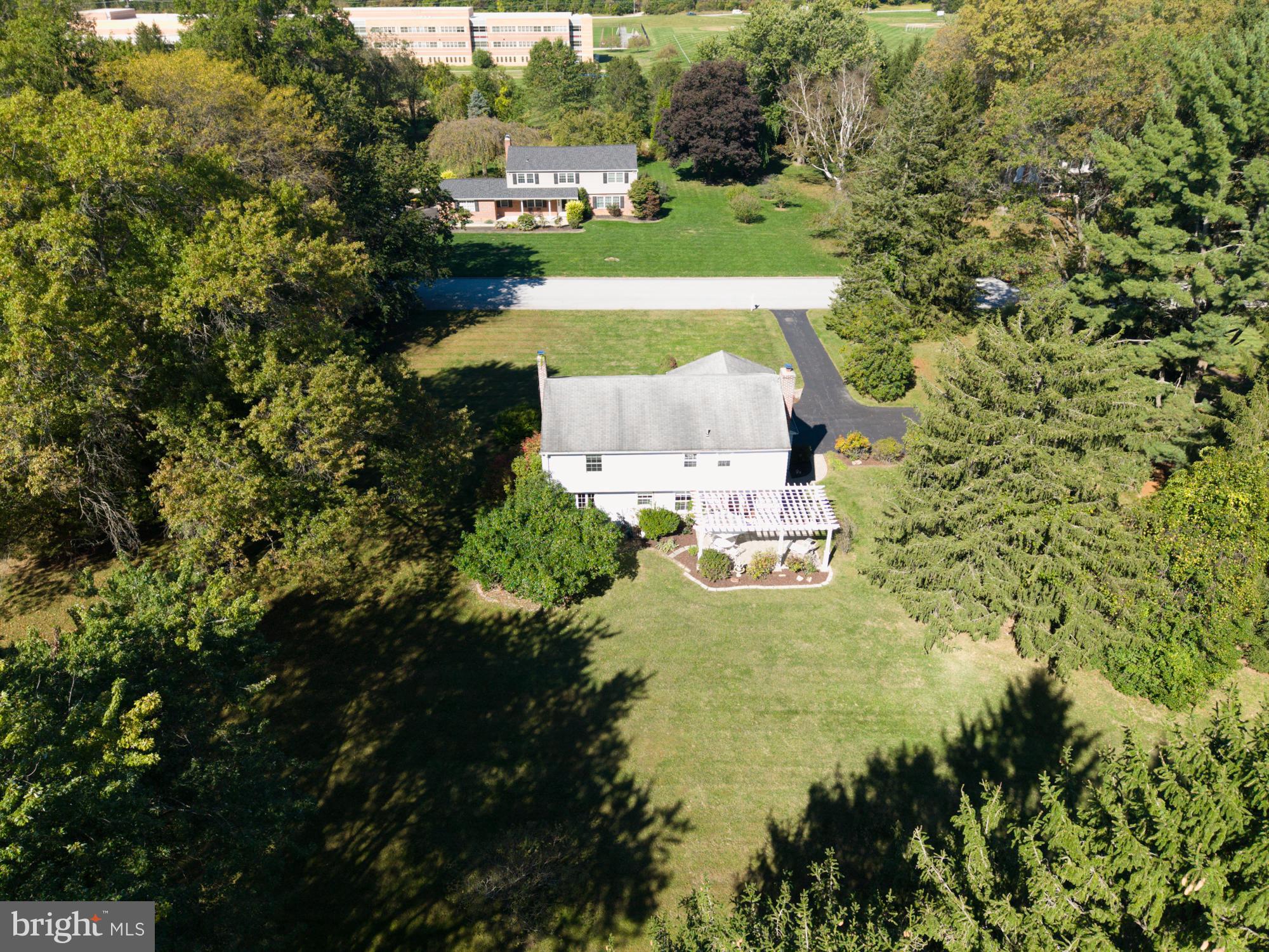 12 Flintshire Road Malvern, PA 19355 - Photo 7 of 50 a view of a house with a yard