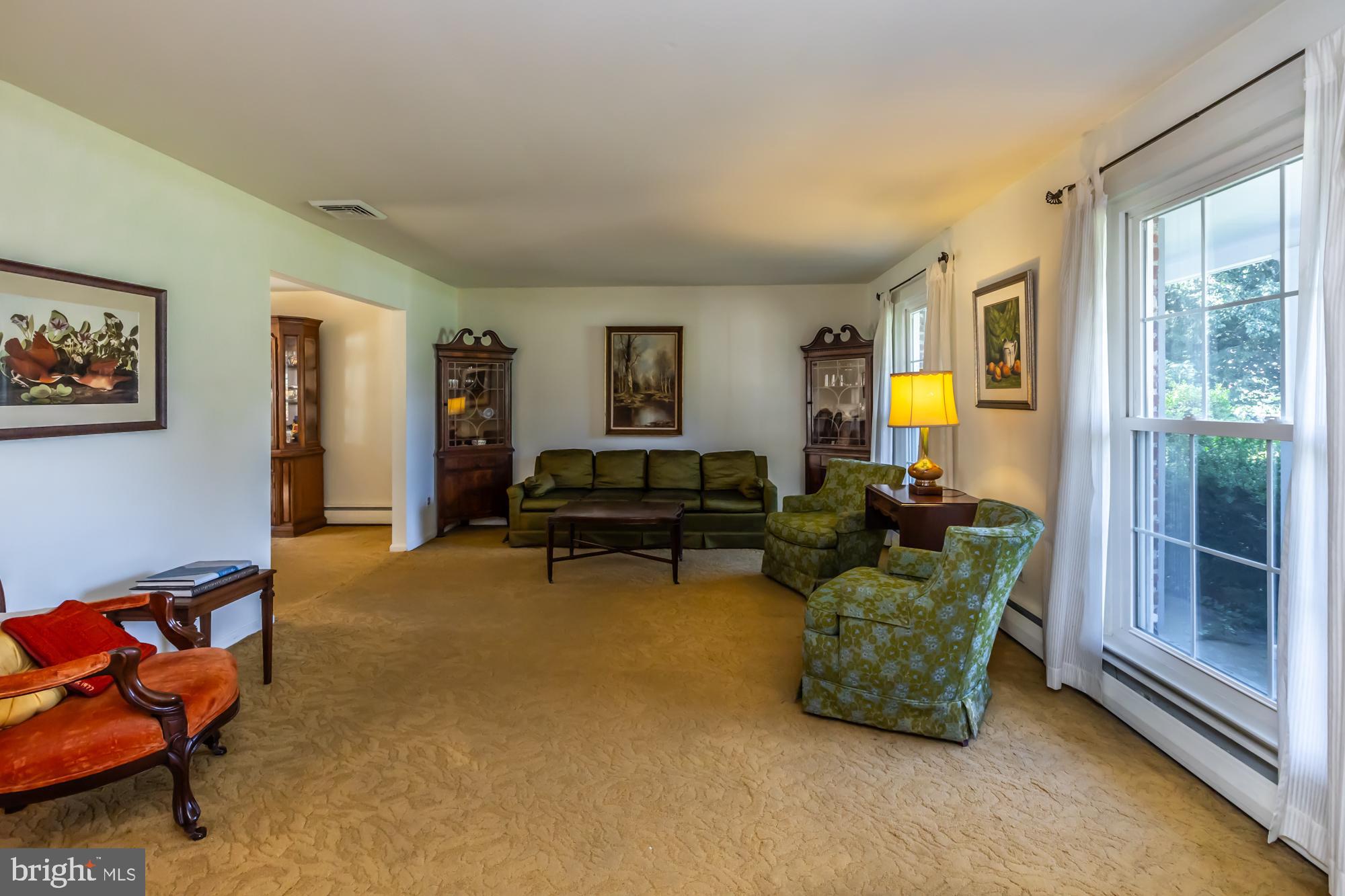 12 Flintshire Road Malvern, PA 19355 - Photo 9 of 50 a living room with furniture and a window