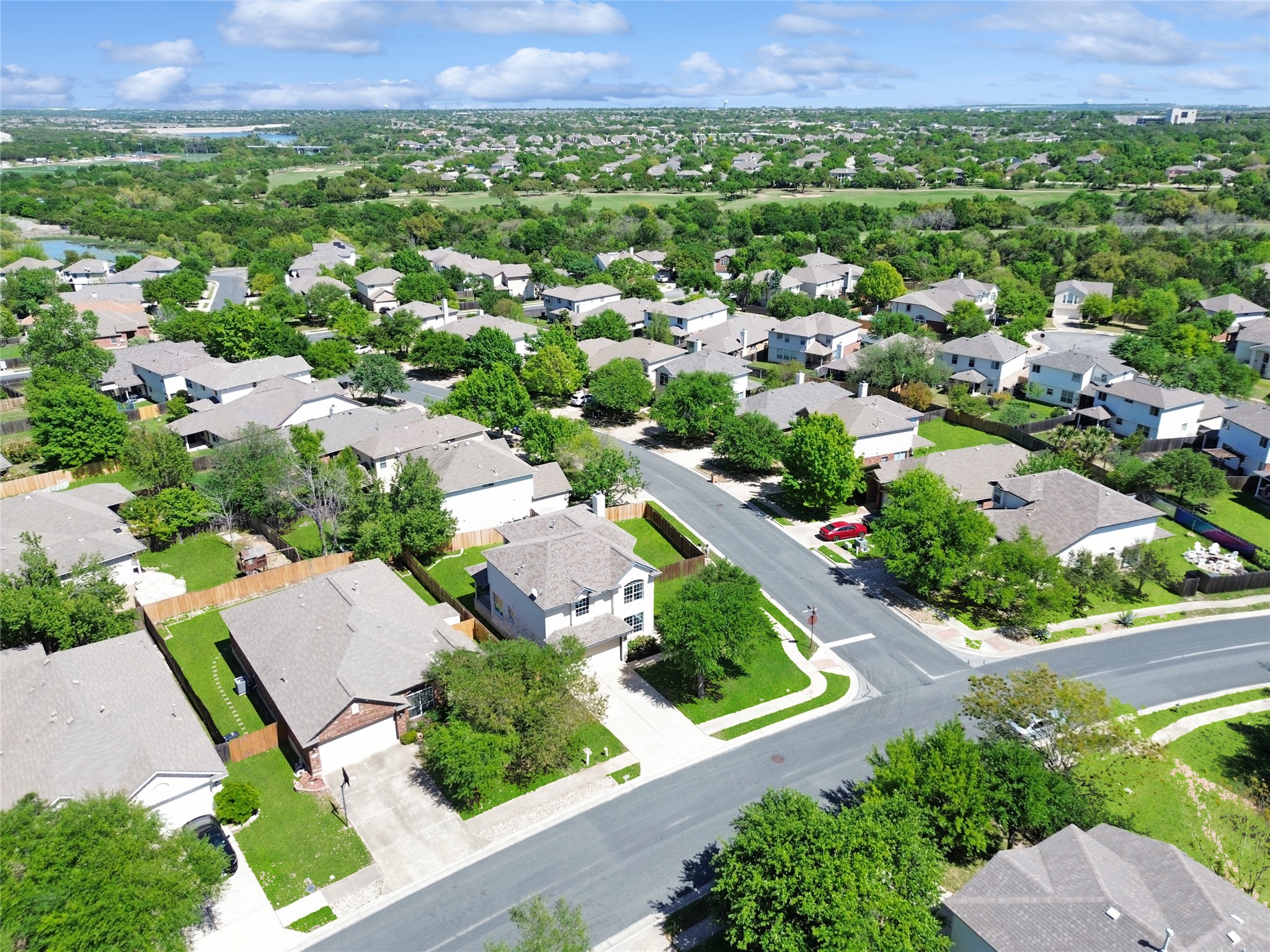 14813 Slingshot Road Austin, TX 78717 - Photo 28 of 28 Drone / aerial view featuring a residential view with golf course shown in the distance.
