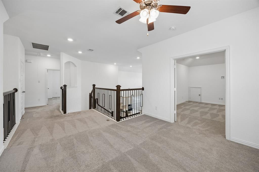 1303 Wheelwright Drive Forney, TX 75126 - Photo 6 of 39 3 flex spaces currently set as office, game room and media offer lots of ways to enjoy this home.