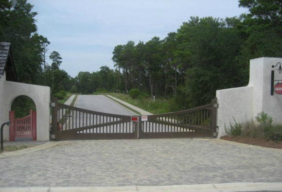 Lot 9 Pine Cone Inlet Beach Inlet Beach, FL 32461 - Photo 3 of 3 a view of street along with deck and garden