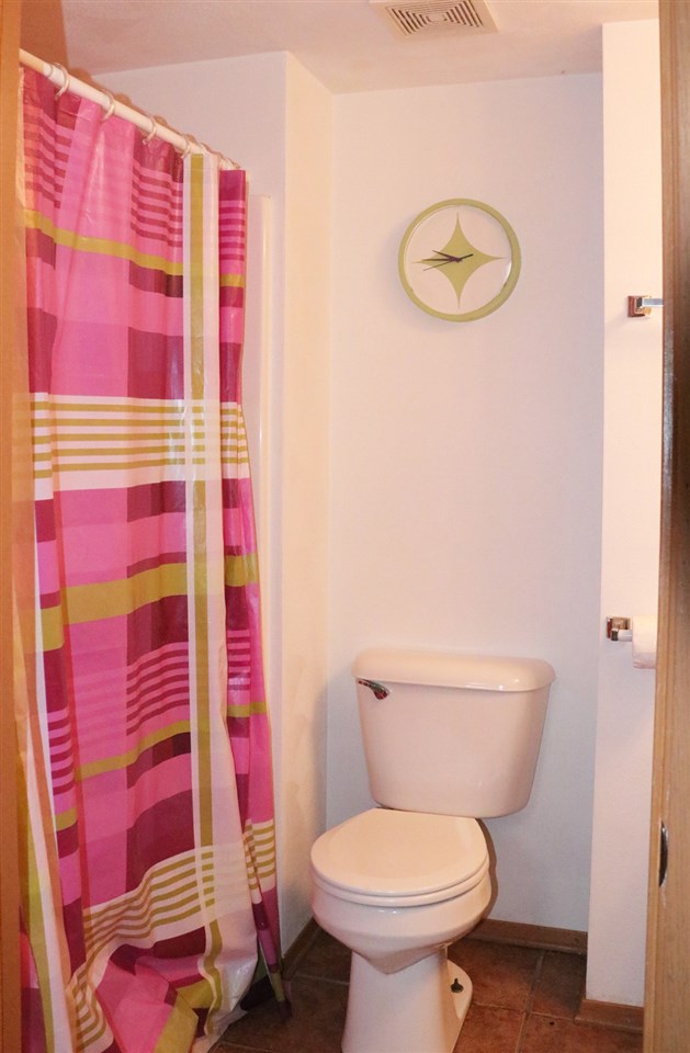 3950 Linden Road Rockford, IL 61109 - Photo 11 of 12 a bathroom with a sink toilet and shower