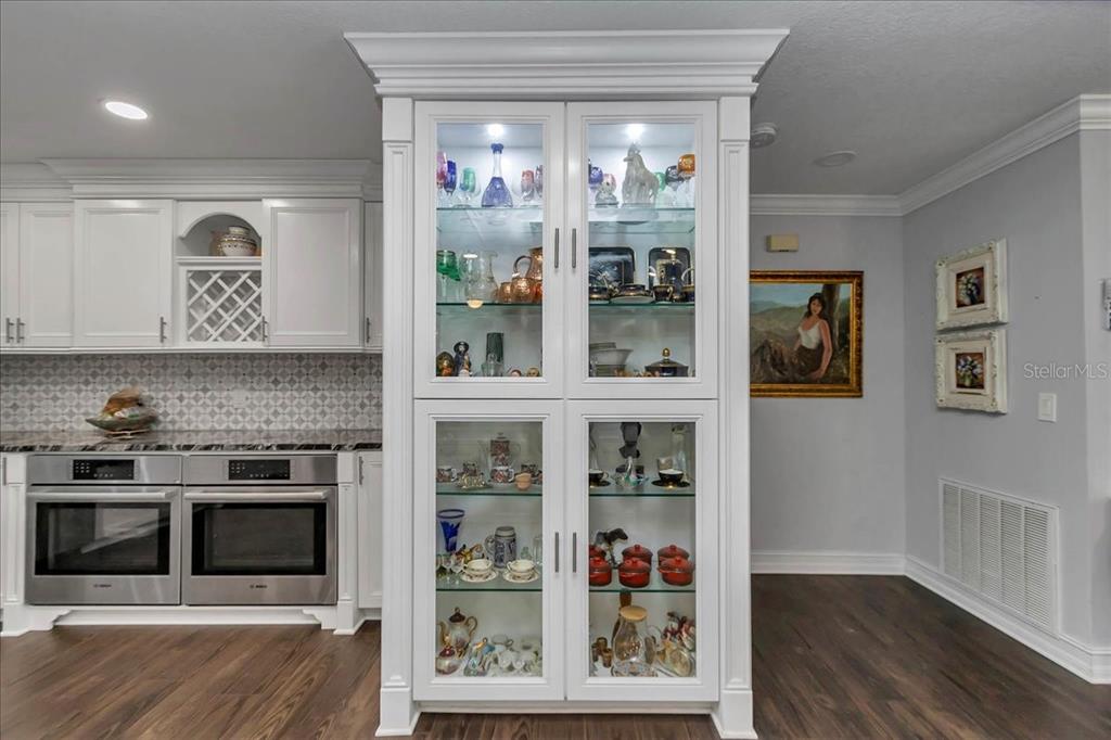 223 South Nesbitt Terrace Inverness, FL 34450 - Photo 21 of 85 a kitchen with stainless steel appliances granite countertop a refrigerator and a wooden floor