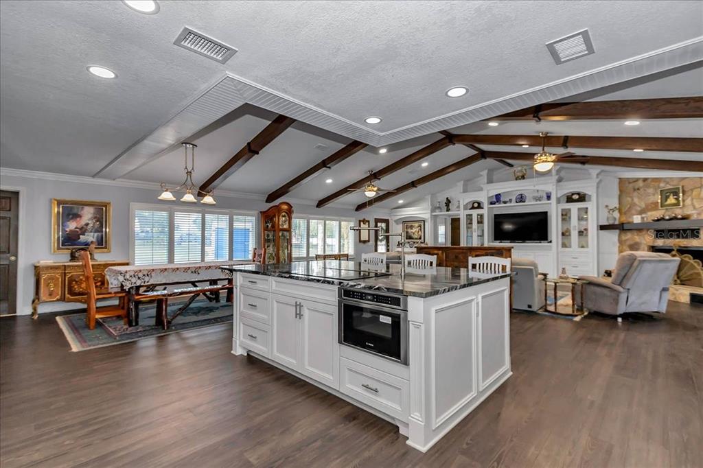 223 South Nesbitt Terrace Inverness, FL 34450 - Photo 23 of 85 a open kitchen with stainless steel appliances granite countertop a stove and cabinets