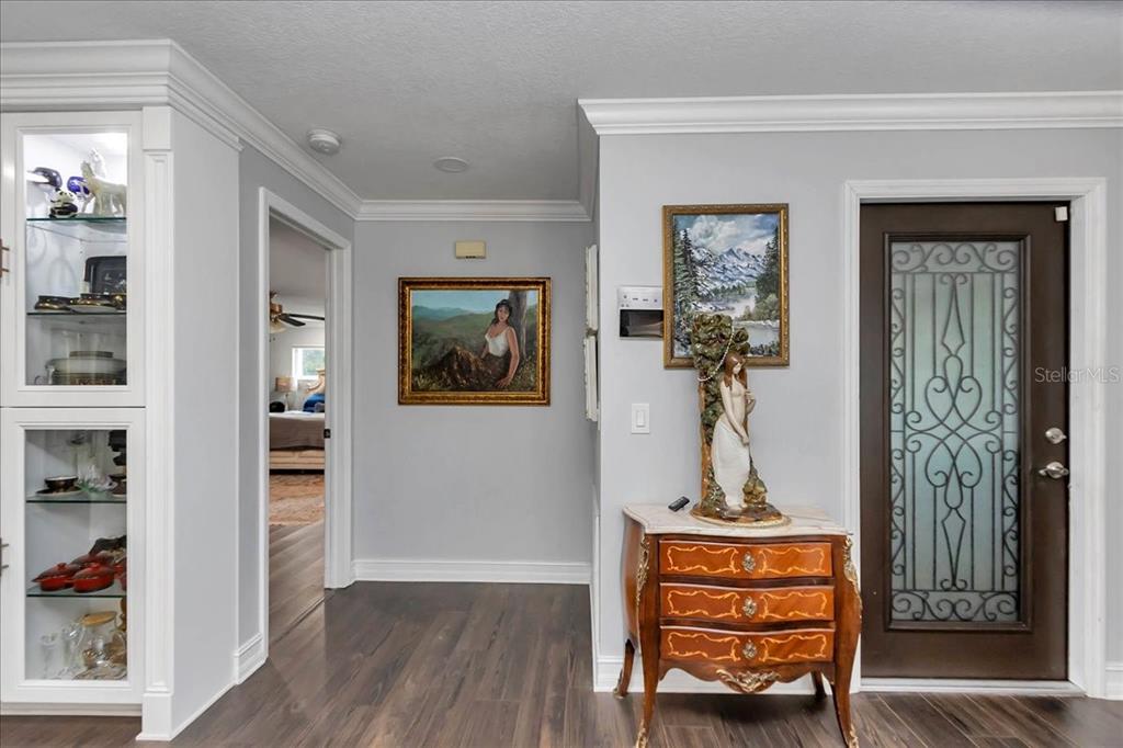 223 South Nesbitt Terrace Inverness, FL 34450 - Photo 36 of 85 a view of hallway with wooden floor and stairs