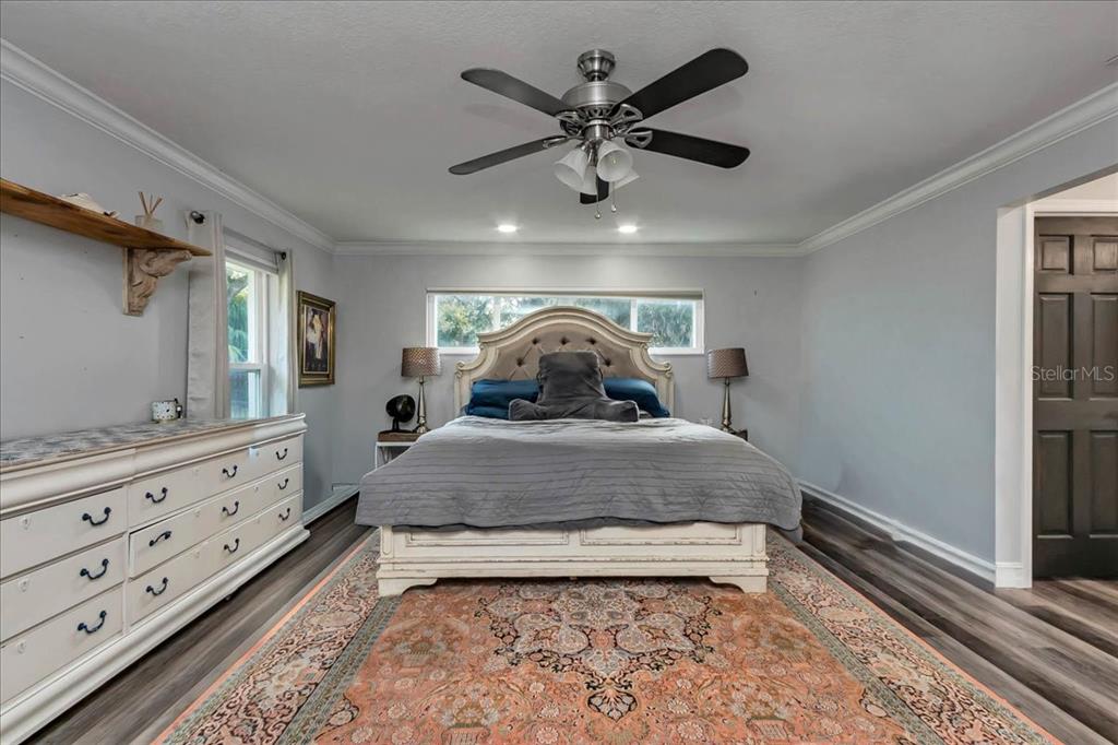 223 South Nesbitt Terrace Inverness, FL 34450 - Photo 37 of 85 a bedroom with a bed and a dresser