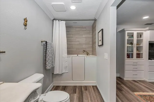 a view of a food mall next to a road